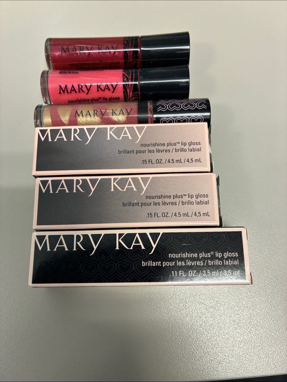 Mary Kay Lip Gloss Trio — Bright Pink, Deep Red, & Shimmery Gold
